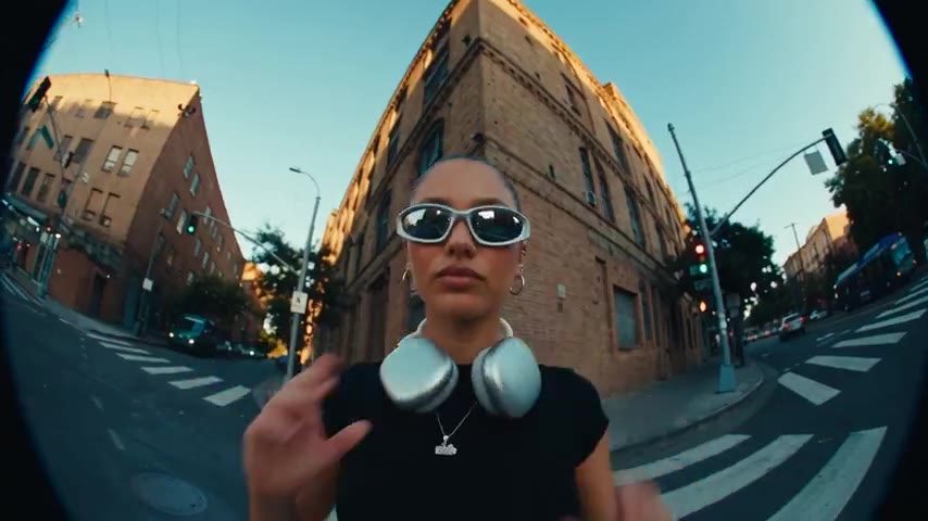 Adult wearing original black-and-ivory streetwear in a pedestrian alley